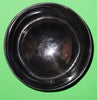 Polished buffalo horn bowl measuring 4" wide by 1 5/8" deep.
