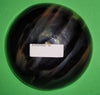 Polished buffalo horn bowl measuring 6" wide by 1 7/8" deep.