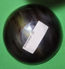 Polished buffalo horn bowl measuring 4" wide by 1 5/8" deep.