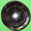 Polished buffalo horn bowl measuring 4" wide by 1 5/8" deep.