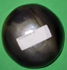 Polished buffalo horn bowl measuring 4" wide by 1 5/8" deep.