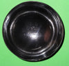 Polished buffalo horn bowl measuring 4" wide by 1 5/8" deep.