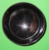 Polished buffalo horn bowl measuring 4" wide by 1 5/8" deep.