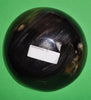 Polished buffalo horn bowl measuring 6" wide by 1 7/8" deep.
