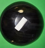 Polished buffalo horn bowl measuring 7" wide by 2 to 2-1/4" deep.