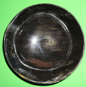 Polished buffalo horn bowl measuring 5" wide by 1 7/8" deep.