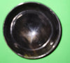 Polished buffalo horn bowl measuring 4" wide by 1 5/8" deep.