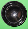 Polished buffalo horn bowl measuring 4" wide by 1 5/8" deep.