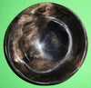 Polished buffalo horn bowl measuring 5" wide by 1 7/8" deep.